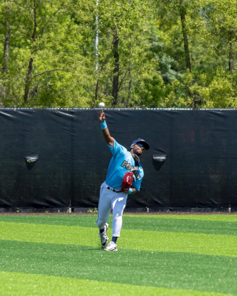 A baseball player throwing a ball