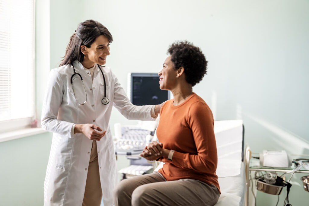 A woman talking to her doctor