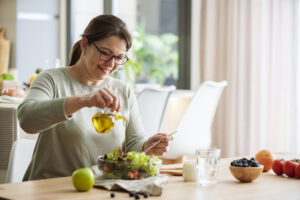 A woman eating a salad