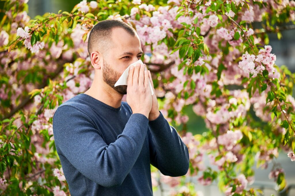 A man blowing his nose