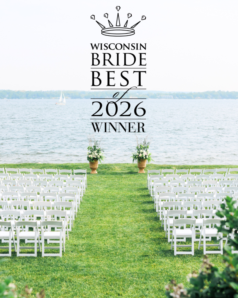 Rows of white chairs lined up by water