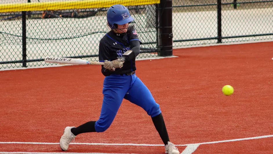 Women playing college softball