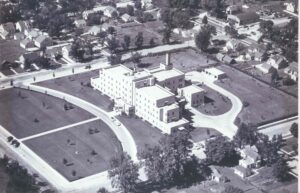 The outside of a hospital from the 1950s