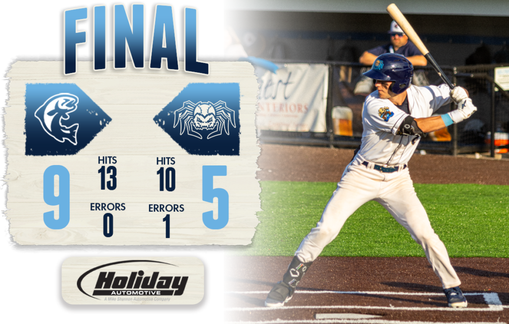 A baseball batter with the final score