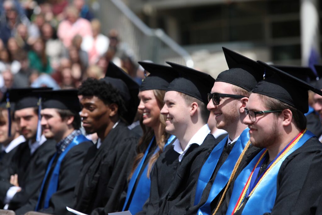 A line of college graduates
