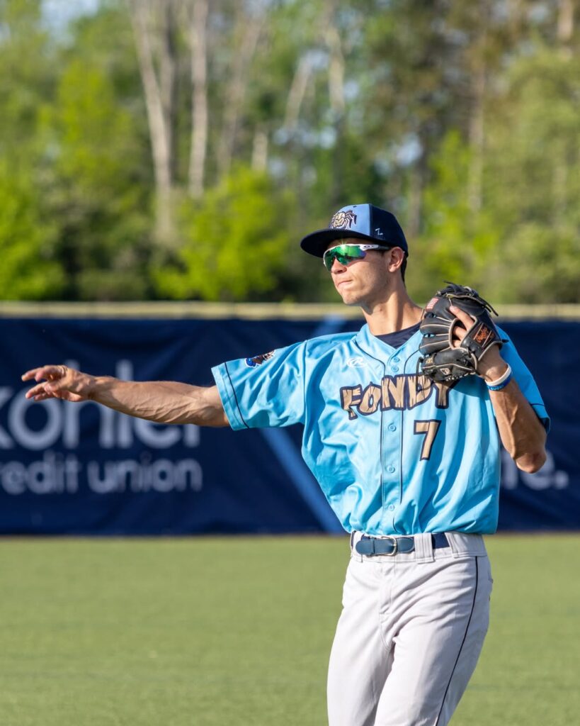 A baseball player throwing