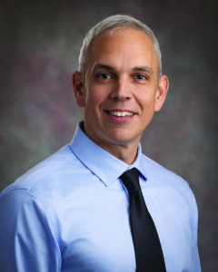 A male doctor in a tie