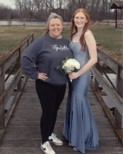 Two women standing outside