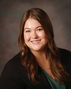 A smiling young professional woman