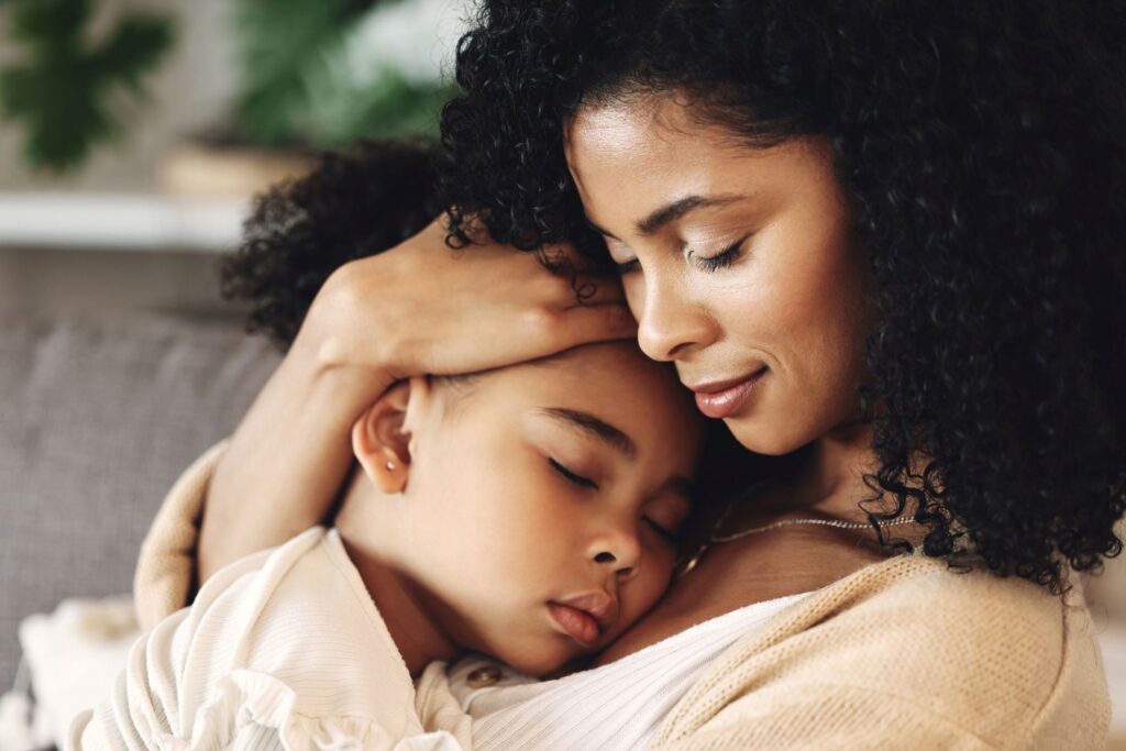 A woman comforting a child