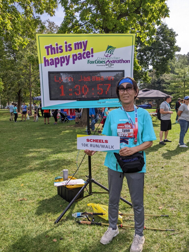 A woman at a race finish line