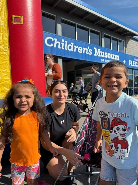 A family outside of the childrens museum