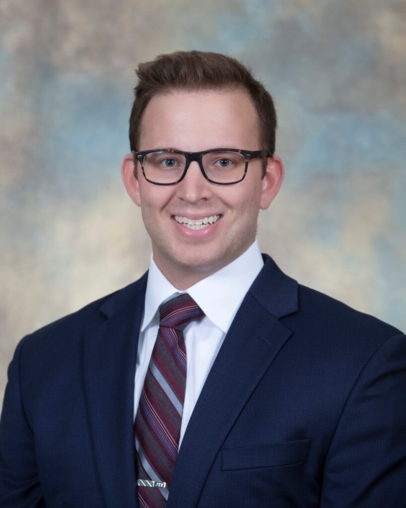 A business man in a suit and tie