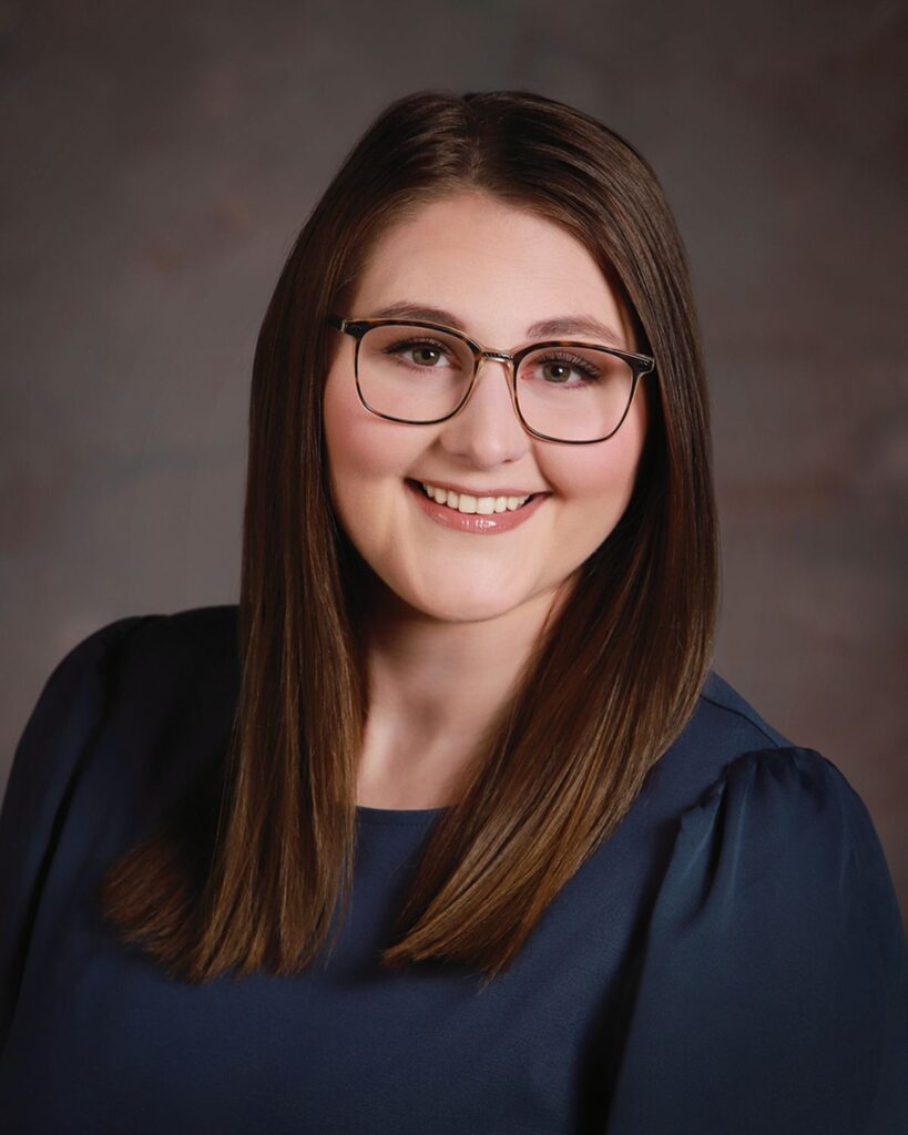 A smiling young professional woman