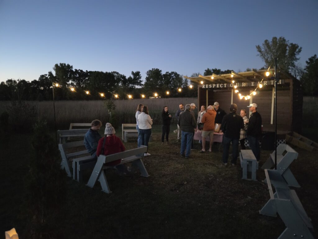 A group of people standing around outside