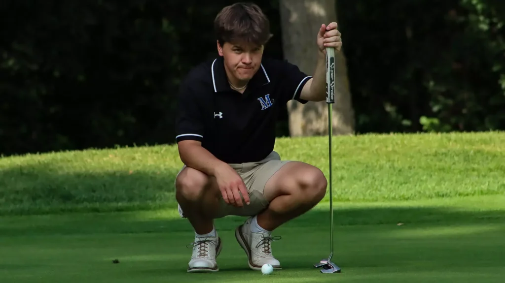 men playing college golf