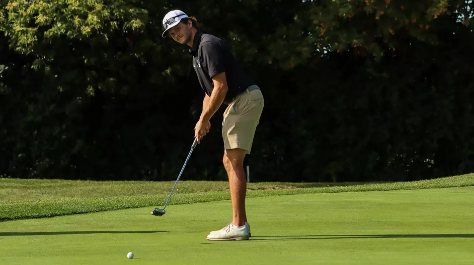 Men playing college golf