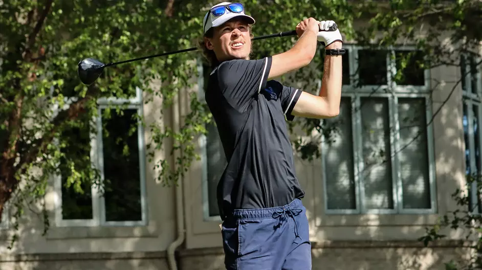 Men playing college golf