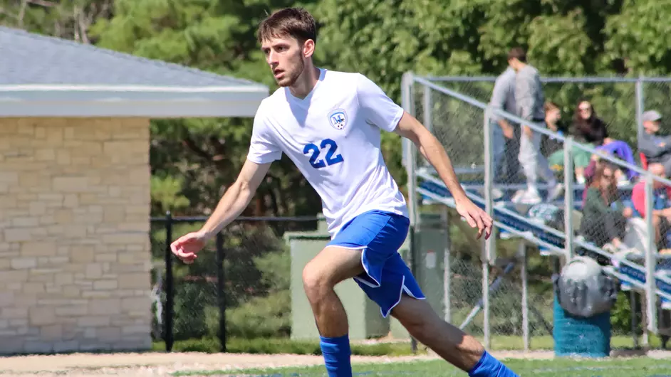 Men playing college soccer