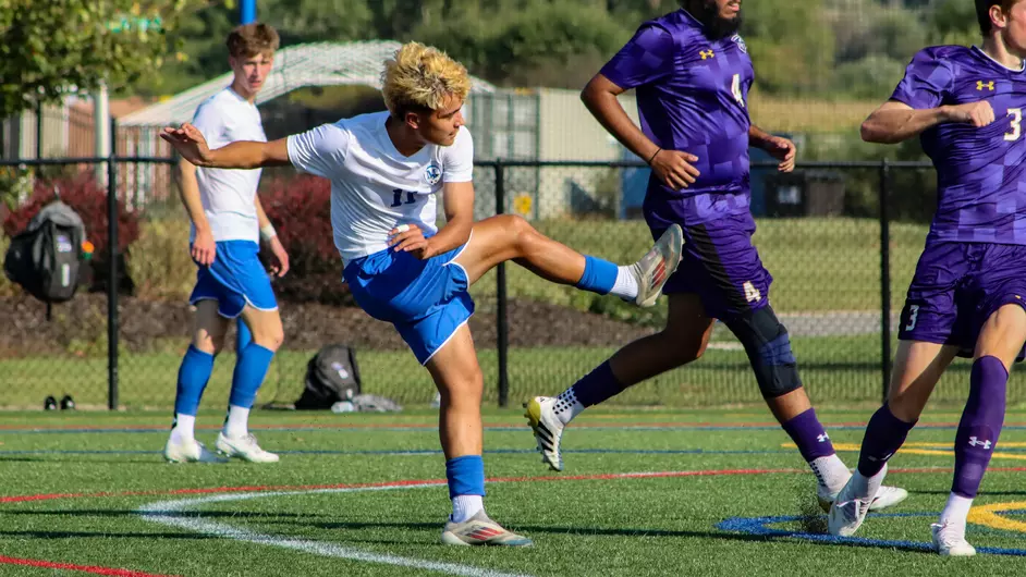 Men playing college soccer