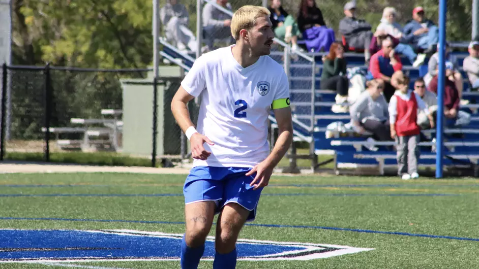 Men playing college soccer