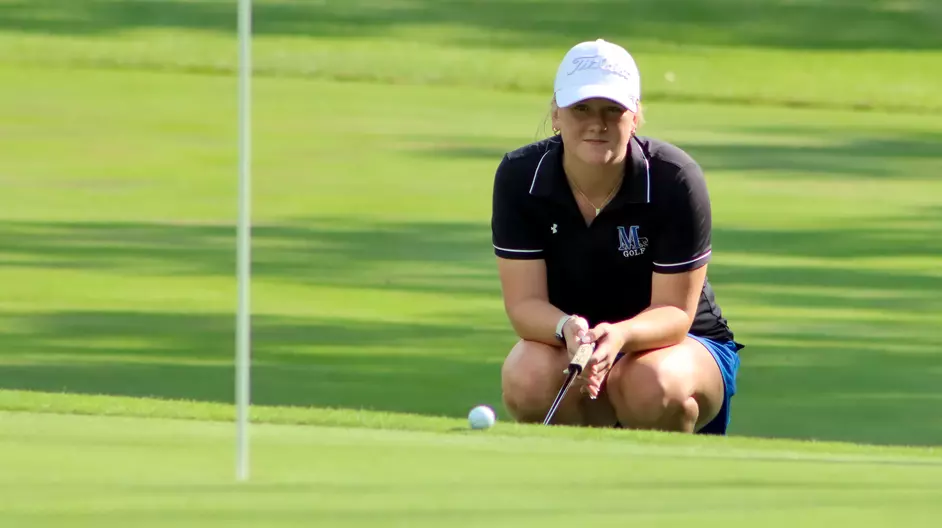 Women playing college golf