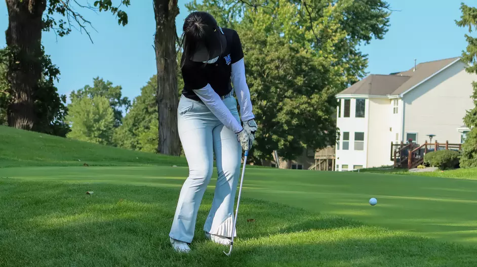 Women playing college golf