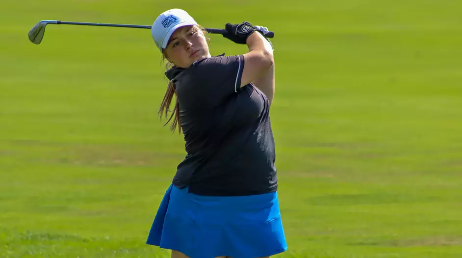 Women playing college golf