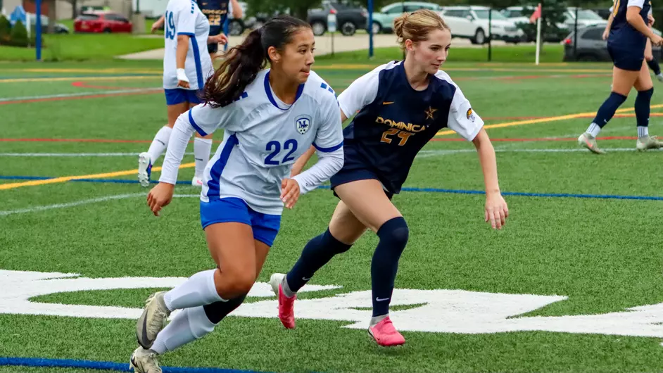 Women playing college soccer