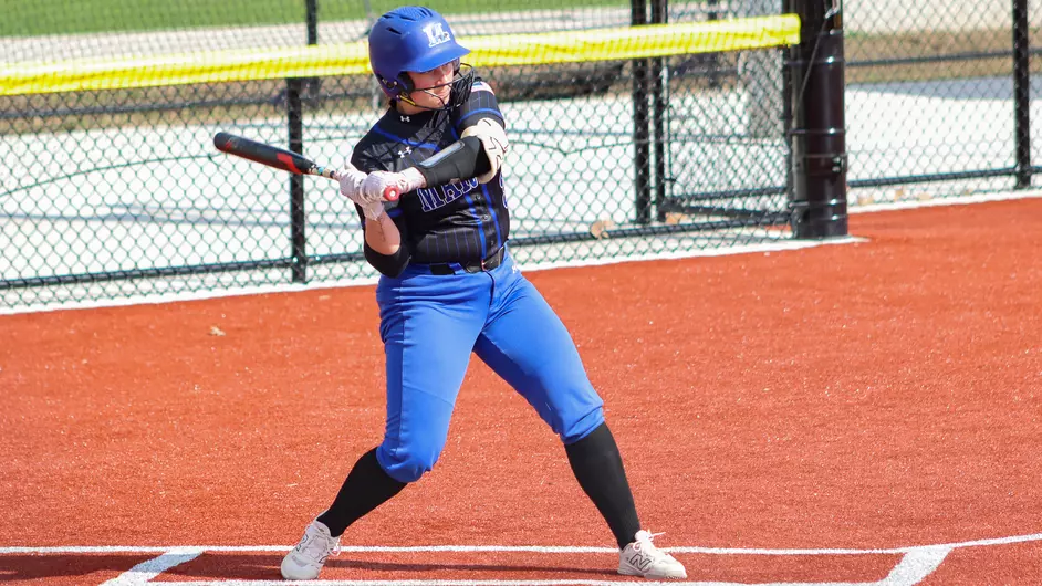 Women playing college softball