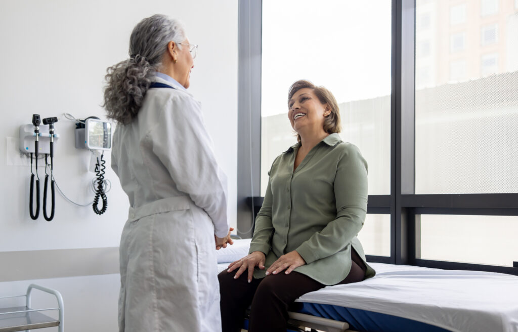 An older female patient meeting with her doctor