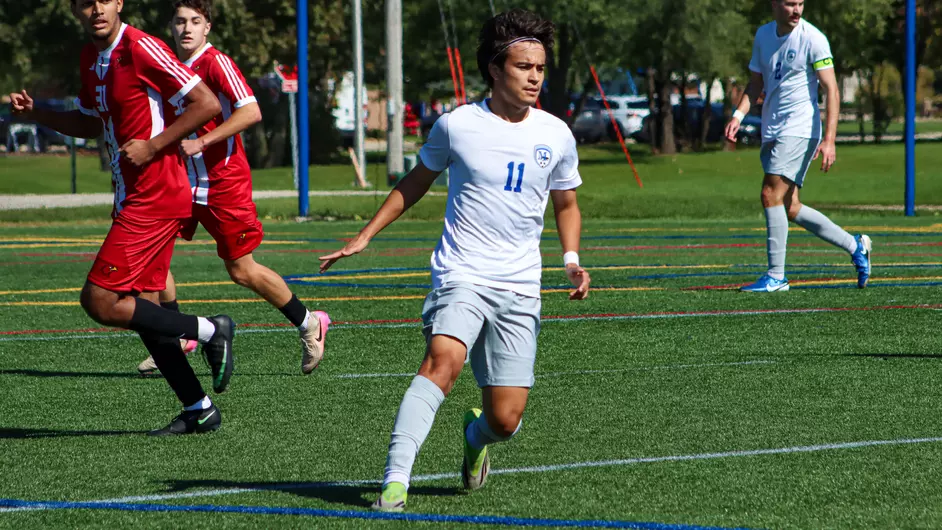 Men playing college soccer