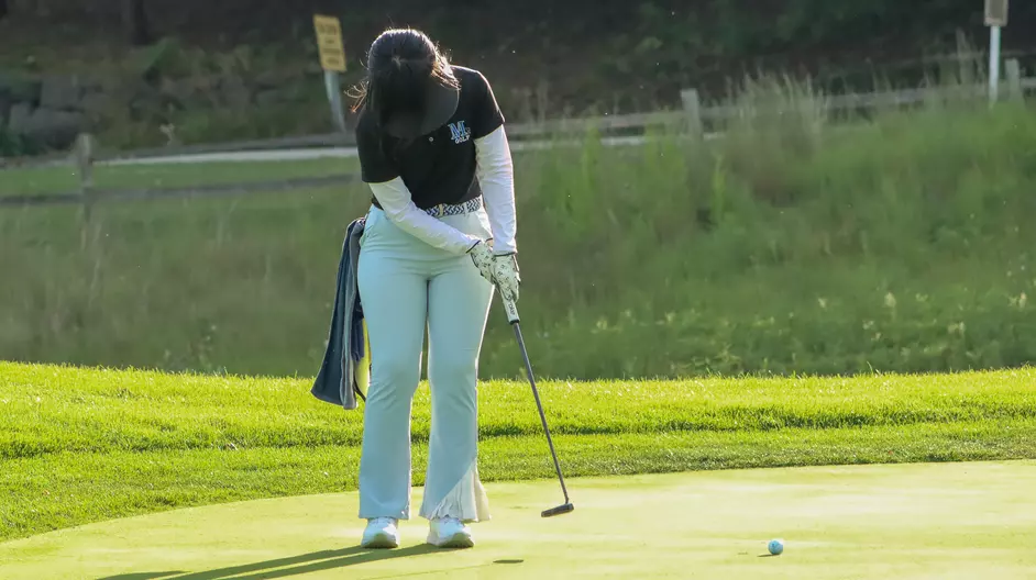 Women playing college golf