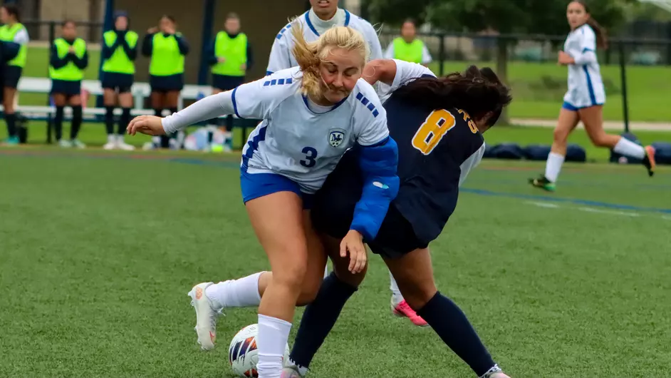 women playing college soccer