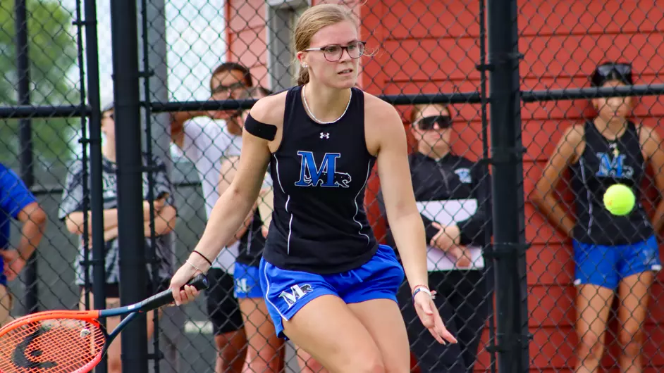 women playing college tennis